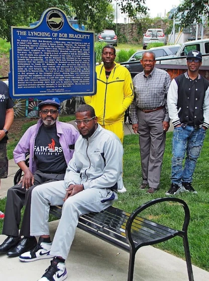 image of people sittiing on bench